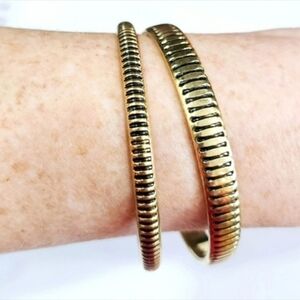 Two Gold and Black Bangle Bracelets